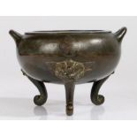 Japanese bronze censer, Meiji period, the circular body with looped handles above a hatched design