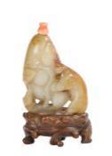 Chinese Qianlong period jade snuff bottle, (1737-1795) a brown and white jade snuff bottle with a