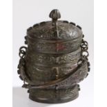 Chinese bronze archaic type ritual wine vessel, with a gadrooned final above a shaped body with