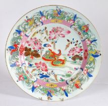 Chinese famille rose porcelain charger, Yongzheng (1723-1735) late 18th Century, with a pair of