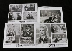 Press release photograph for the film Toys, to include four photographs  Provenance: From a media