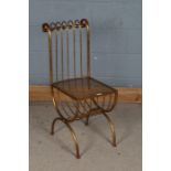 20th century gilt metal chair, in the Continental taste, with scroll back rest, mesh work seat and