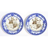 Pair of Doulton Armorial porcelain plates, each with a crest and motto, 24.5cm wide, (2)
