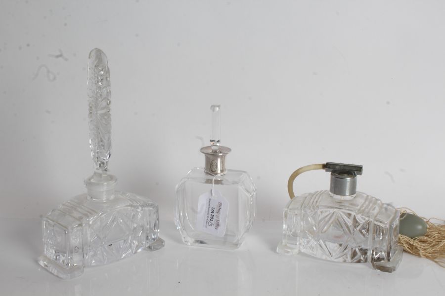 German silver mounted glass scent bottle, the silver collar stamped 830, together with a glass