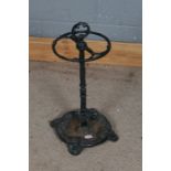 Cast iron stick stand, with two divisions and loop carrying handle, 56 cm tall approx.