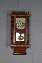 Victorian walnut Vienna wall clock, having inlaid decoration, the singe glazed enclosing a dial with