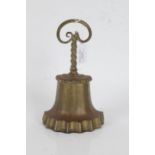 Regency brass doorstop, the twisted serpent handle above a gadrooned stem and tapering lower