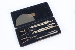 Cased set of drawing instruments, to include various compasses etc