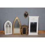 Five various mirrors, to include three with cherub decoration, and two of arched form (5)