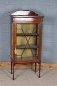 Edwardian mahogany and inlaid display cabinet, having single astragal glazed door enclosing two