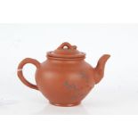 Chinese terracotta teapot, decorated with branches, having lift up lid and filter, character marks