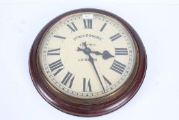 Synchronome Electric clock, London, housed in a mahogany case, the dial with roman numerals, 38cm