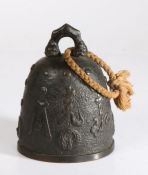 Chinese bronze bell, cast with shallow bosses and character marks, 16.5cm high