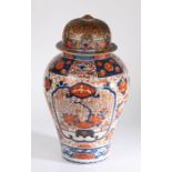 A large Japanese Imari vase and cover, the domed cover (AF) above a baluster body decorated in the