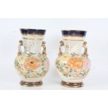 Pair 19th century Japanese porcelain vases, with brightly coloured blossoming flowers and