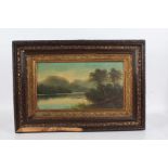 Victorian School, study of a lake and hills, unsigned oil, housed in a gilt decorated frame, 43cm