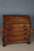 George III mahogany bureau, the sloping fall enclosing a pigeon holed interior and drawers, fitted