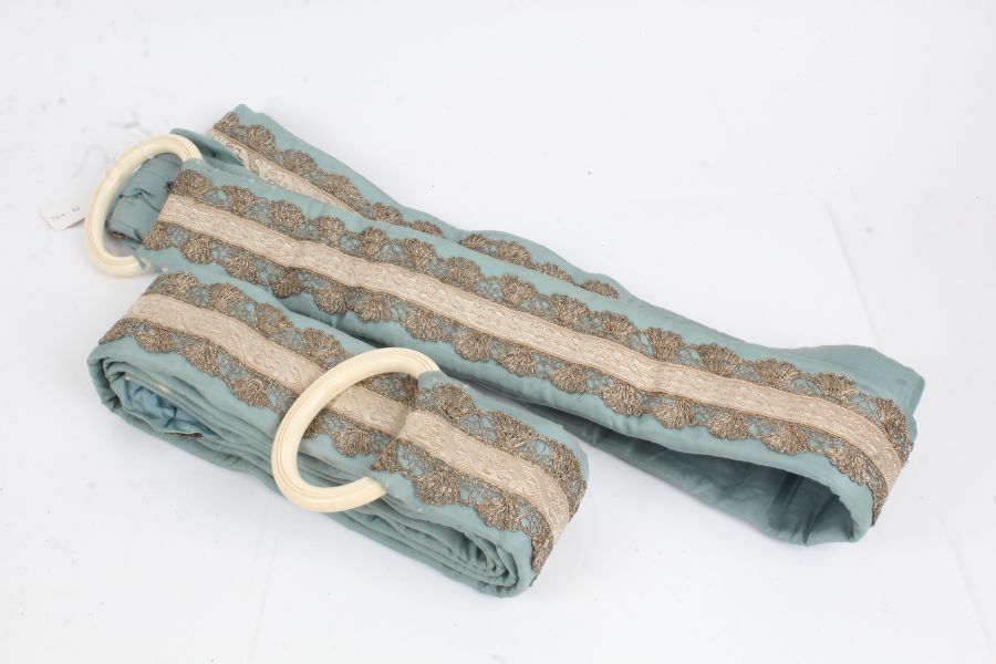 A pair of long Victorian country house embroidered servants’ bell pulls, the turquoise silk pulls