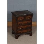 Mahogany effect chest of drawers, of small proportions, fitted short over three long drawers, 47cm