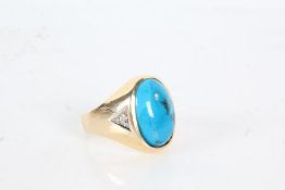 14 carat gold ring, the head set with turquoise coloured stone and diamonds to the shoulders, ring
