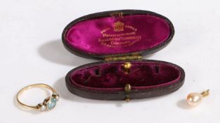 A 14ct gold pearl earring and an 18ct gold collar stud encased in a leather clad jewellery box, with