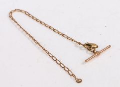 A 9ct yellow gold link chain and t-bar. Weighing 2.10 grams.