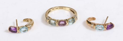 A 9ct gold ring set with aquamarine, amethyst and diamonds. Ring size O . With a matching pair of