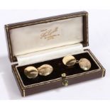 A pair of 9 carat gold oval cuff-links, weighing 10.2 grams housed within a jewellery box. Approx.