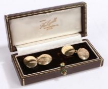 A pair of 9 carat gold oval cuff-links, weighing 10.2 grams housed within a jewellery box. Approx.