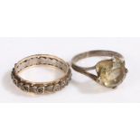A 9ct gold and silver eternity ring, A central silver band with two outer 9ct gold bands. Weighing