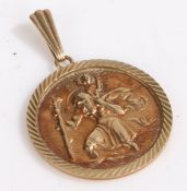 A 9 carat yellow gold St Christopher pendant, weighing 4.1 grams. Approx. diameter 25mm.