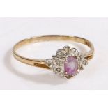 A 9ct gold amethyst and diamond cluster ring. Ring size W. Weighing 1.9 grams.