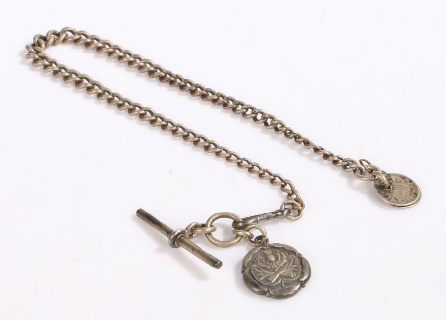 A silver pocket watch chain with an NRA rifle club pendant and t-bar chain with two 3 pence coins,