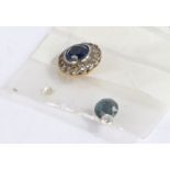 A sapphire and diamond cluster ring. Approx. sapphire carat weight 1.00cts. Total approx. diamond
