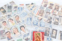 Collection of reproduction cigarette cards, to include "A gallery of 1934", Film Stars etc., and a