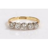 An 18ct yellow gold ring set with five diamonds. Approx. total diamond carat weight: 0.50cts.