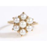 A 9ct yellow gold pearl cluster ring. Approx. diameter of pearls: 4.00mm. Ring size N. Weighing 3.80