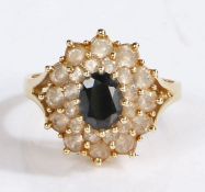 A 14ct yellow gold cluster ring with a blue sapphire surrounded by white sapphires. Ring size O.