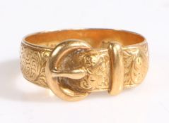 An 18ct yellow gold buckle ring. Width of buckle: 8.60mm.  Ring size K. Weighing 3.70 grams. Used,