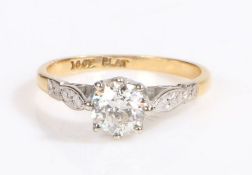 An 18ct gold diamond solitaire ring. Approx. diamond carat weight 0.70cts. Colour G. Clarity: VS2-