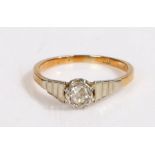 An 18ct yellow gold and platinum diamond solitaire ring. Approx. diamond carat weight: 0.16cts.