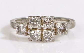 A white Indian metal ring set with six diamonds. Approx. total diamond carat weight: 1.00cts.