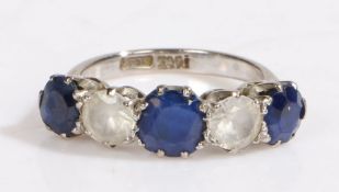 An 18ct white gold blue and white sapphire ring. Approx. total carat weight of blue sapphires: 1.