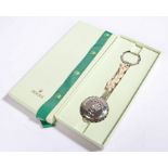 Rolex keyring, the crown and Rolex engraved split ring above a knotted rope centre and pendant in