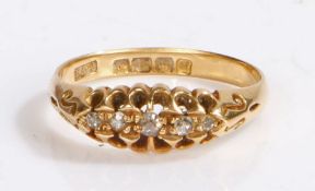 An 18ct yellow gold ring with five diamonds. Approx. total diamond carat weight: 0.08cts. Colour J-