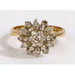 An 18ct yellow gold diamond cluster ring. Total approx. diamond carat weight: 0.25cts. Colour: J-