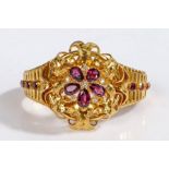 A yellow metal Victorian cluster bracelet set with amethysts and diamonds. Approx. total diamond