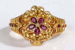 A yellow metal Victorian cluster bracelet set with amethysts and diamonds. Approx. total diamond