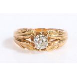 An 18ct yellow/rose gold solitaire old cut diamond ring. Approx. diamond carat weight: 0.66cts.