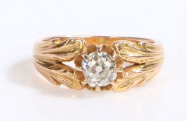 An 18ct yellow/rose gold solitaire old cut diamond ring. Approx. diamond carat weight: 0.66cts.